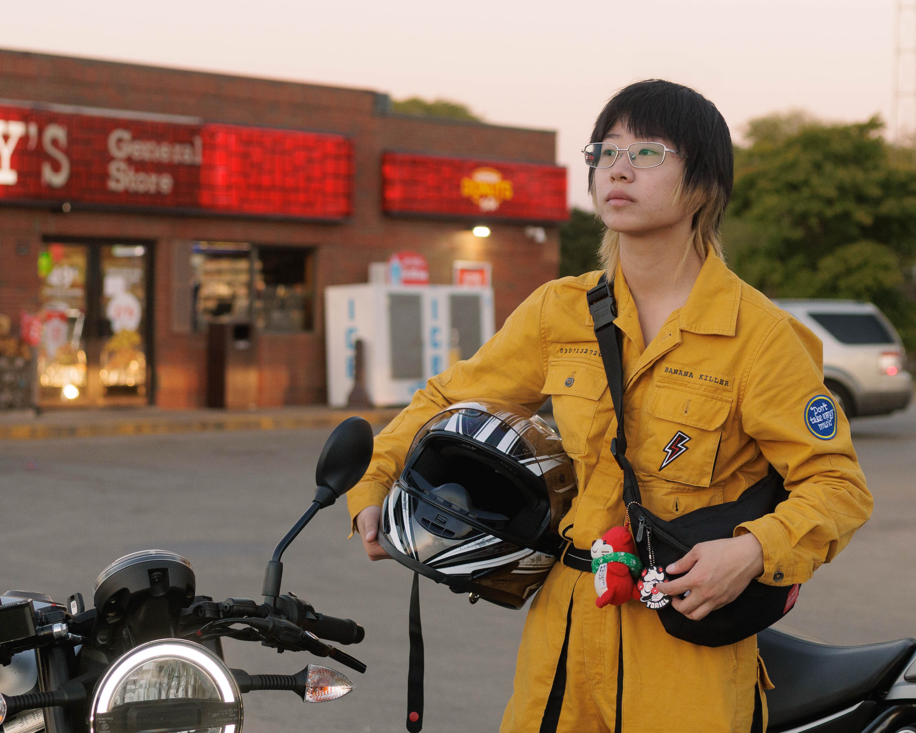 Mengting with a motorcycle